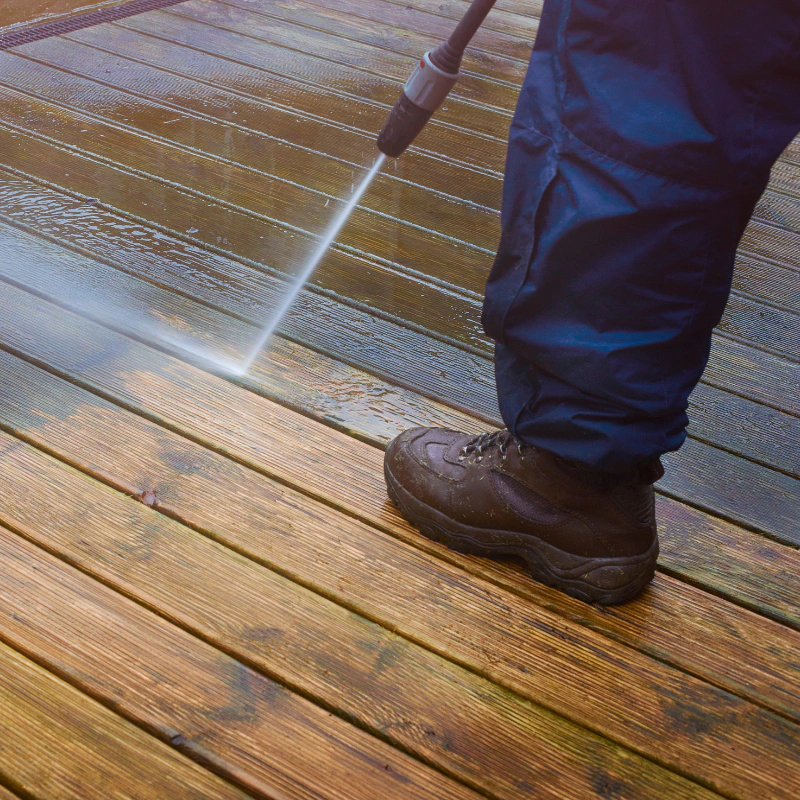 ongoing pressure washing of the wooden deck